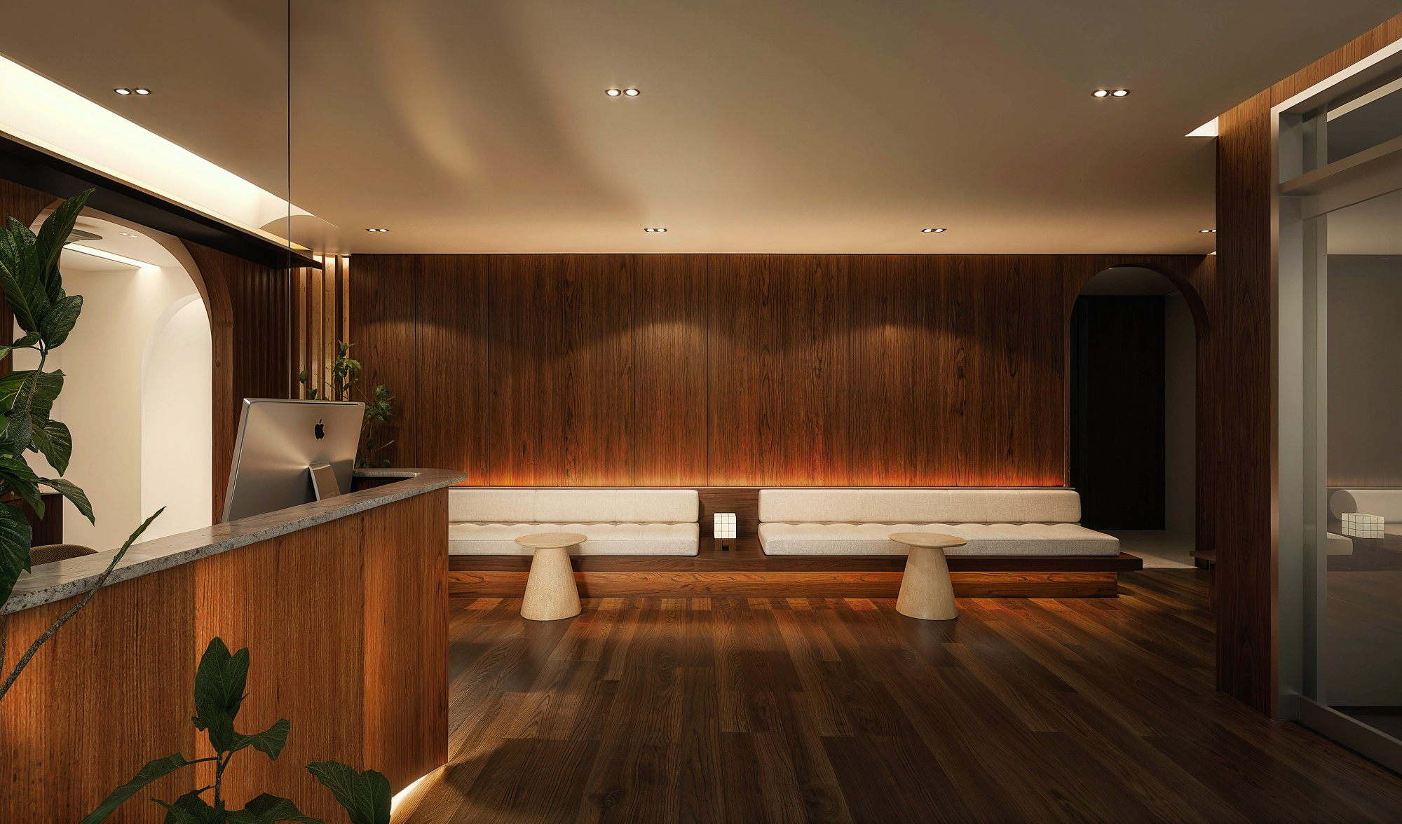 The lounge at Miso Orthodontic Studio: walnut panelling, cove lighting and a long linen bench
